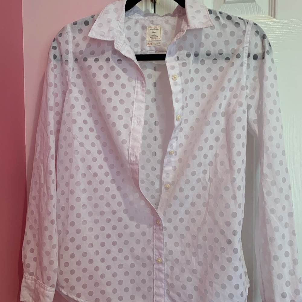 White polka dot shirt